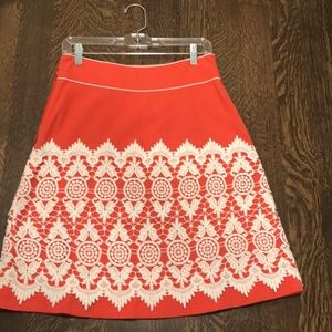 Tangerine with lace overlay skirt. size 2